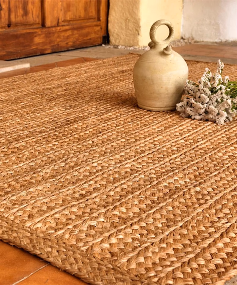 Natural abaca carpet on terracotta tile — Mami Carpets